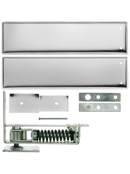 Standard Duty Swinging Door Floor Hinge With Plated-Steel Cover Plates in Polished Chrome.
